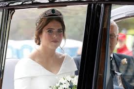 In turn, meghan wore queen mary's diamond bandeau tiara, also on loan from the queen. Princess Eugenie And Meghan Markle Who Made Princess Eugenie S Dress And How Does It Heart