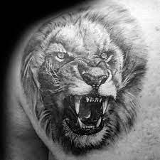 50 Lion Shoulder Tattoo Designs For Men Masculine Ink Ideas Mens Lion Tattoo Lion Shoulder Tattoo Roaring Lion Tattoo