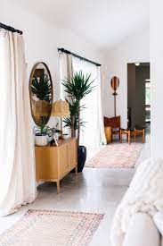 This is one of the most popular home exterior styles lately; A Surf Inspired House In Charleston Sc For Barefoot Living Remodelista Concrete Floors Living Room Concrete Floors Bedroom Rugs In Living Room