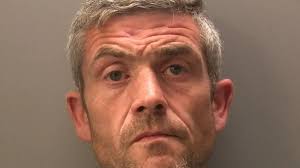 Barrow man Darren Knowles wanted by police after street stabbing