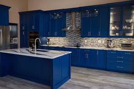Turn your kitchen into an exciting space by choosing flooring with fun patterns to complement the blue cabinets. Remodel Stories A Bright Blue Show Stopper Dura Supreme Cabinetry