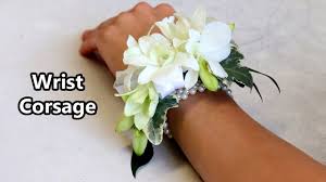 Use silk flowers so you can make the corsages as far in advance as you want—and because they'll last forever. How To Make A Wrist Corsage Youtube
