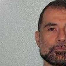 Evil' cannibal jailed for 24 years for bondage murder of police officer