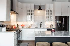 Add small molding borders around the doors or even add beadboard to the front transform their smooth appearance. Cheap Kitchen Cabinet Upgrade Ideas Apartment Therapy