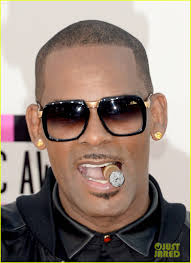 R. Kelly Smokes Cigar
