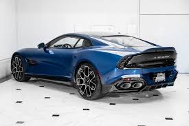 Image result for Concours Blue 2025 Aston Martin