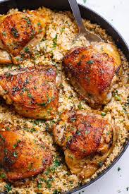 Buttery Garlic Herb Chicken And Lemon Cauliflower Rice Garlic Herb Chicken Healthy Recipes Chicken Thigh Recipes