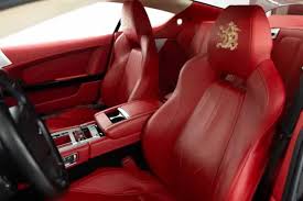 Image result for Amethyst Red 2012 Aston Martin