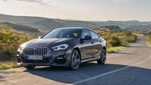 Collectively, the lidded headlights, bulging curved hood. The Bmw 228i Xdrive Gran Coupe Is Not What I Was Expecting