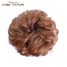 A bun is a type of hairstyle in which the hair is pulled back from the face, twisted or plaited, and wrapped in a circular coil around itself, typically on top or back of the head or just above the neck. Aisi Hair Brazilian Human Hair Curly Flax Yellow Chignon Bun Elastic Rope Rubber Band Hairpiece Clip In Extension For Women Buy Top Quality Human Hair Chignon Cheap Donut Curly Chignon Bun Human Hair