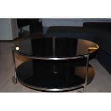 Cali round coffee table w casters el dorado furniture 24 of the best things to from wayfair s 48 hour clearout farmhouse with progressive grove 38 in chocolate mahogany medium wood t631 02 home depot magnussen dakota rustic pine t4017 45 castered industrial wheels bernhardt profile stratus. Ikea Round Black Glass Coffee Table W Casters Aptdeco