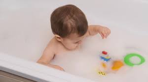 Make sure the water isn't too hot. A Baby Boy Have A Stock Footage Video 100 Royalty Free 1046326291 Shutterstock