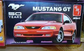 This model kit comes with most of what you'll need to build it: 1997 Ford Mustang Gt Anniv 1 25 Scale Plastic Model Car Kit 864 By Amt 864