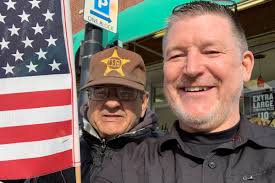 In 2018 we shared the story of Greg Gavagan, a 69-year-old retiree who can  be found at Blackbird Cafe in the wee hours of the morning with a flag in  hand. That