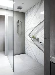 Rhys Jones And This Marble Bathroom Tile Accent Wall Are A Match Made In Heaven That Slab Work Is Beyond B Bathroom Interior Modern Bathroom Bathrooms Remodel