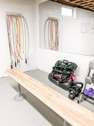 How To Turn Your Unfinished Basement Into A Home Gym The Fit Foodie Mama Home Gym Basement Home Gym Flooring Unfinished Basement