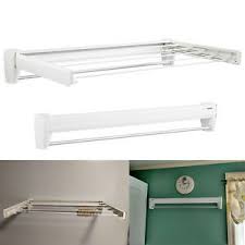 An easy way to do this is by clipping clothing to a clothesline set up either indoors or outdoors. Wall Mount Retractable Drying Rack Hanger Laundry Room Hanging Clothes 5 Rods 47738832015 Ebay