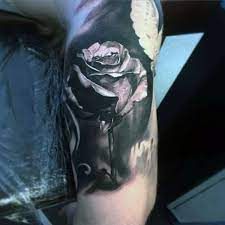 Rather than using an outline to create the tattoo's image, negative space tattoos use the skin as the outline and the pigment as the normally blank parts of a design. 90 Black Ink Tattoo Designs For Men Dark Ink Ideas