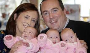 Sally & Barry McLaughlin, from OMAGH, with triplets Emily, Ava and Clara...  IT'S a million to one chance, but Omagh's Sally McLaughlin has defied the  odds and given birth to identical girl