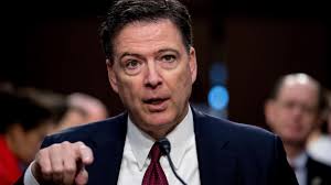 The Latest: Judge dismisses cases against James Comey and Letitia James