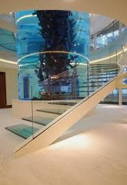 This Is An Amazing Staircase Designed By Diapo A Cantilevered Glass Helical Staircase With Large Cylinder Aquarium At The Cen Luxury Homes My Dream Home House