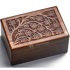 You can have your pet's photo laser engraved on a wooden pet urn. Star India Craft Beautifully Handmade Tree Of Life Engraved Wooden Cremation Urns For Ashes Adult Dark Brown Wooden Keepsake Funeral Urns Memorial Urns For Pets Ashes Small 6 X 4 X 2 75 Walmart Canada