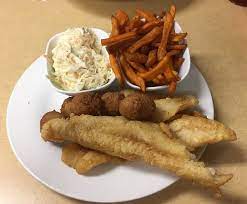 Dip a catfish fillet in the milk, and shake off any excess. Classic Soul Fried Catfish Fillets Sides Picture Of The House Of Fish Aberdeen Tripadvisor