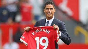 Raphael varane is very close to completing his move to manchester united and he is being backed to make a quick impression by former chelsea defender john terry . Mdoxg5fjlu8abm