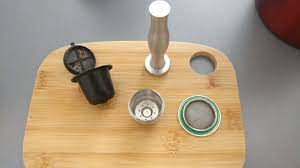 Nespresso machines brew espresso and coffee from coffee capsules. How To Use Nespresso Reusable Capsules Coffee Geek