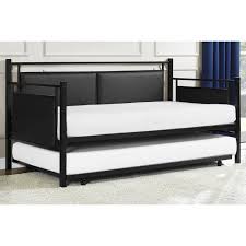 The trundle can be used as an extra sleeping space at night and can be conveniently rolled underneath during the day. 10 Trundle Beds We Love Apartment Therapy
