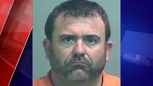 Teacher caught video taping in tanning salon