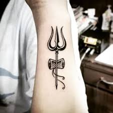 Black Trishul With Pellet Drum Tattoo On Forearm Tattoos For Guys Trishul Tattoo Designs Shiva Tattoo