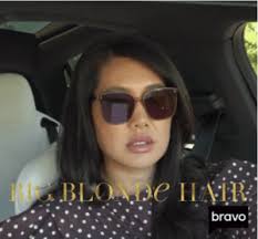 Crystal Kung Minkoff's Tan Sunglasses