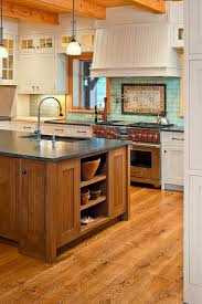 Kitchen With White Cabinets And A Wood Island Matching Wood Floors Wood Floors Wide Plank Wood Floor Kitchen White Oak Kitchen
