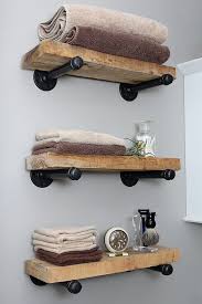 The unit is roughly 6ft wide by roughly 8ft tall and first we drilled some holes in the wood for the pipe to fit through. How To Build Diy Pipe Shelves For Your Home From Scratch