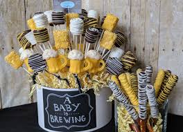 A Baby Is Brewing Party Sampler With Rice Krispy Pops Oreo Pops And Marshmallow Pops Beer Baby Shower Brew Baby Shower Baby Shower Bbq