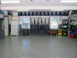 Garages storage garage organization organization tips and hacks how to go vertical keep brooms, mops and dustpans off the floor and out of the way by crafting a handy organizer out of scrap wood and pipe straps. Best Garage Organization System Best Garage Organization Ideas Home Design Ideas Garage Organization Garage Organization Systems Garage Organization Diy
