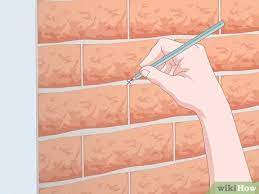 Hanging frames on brick is easy. 3 Simple Ways To Hang Garland On Brick Wikihow