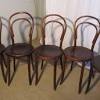 Explore chairs with rattan peel woven over a solid wood frame. 1