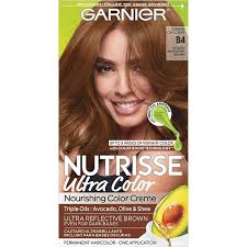 Choose pieces of hair that the sun would naturally hit, and apply the dye. Nutrisse Ultra Color Caramel Chocolate Hair Color Garnier
