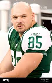 St. Louis Rams new tight end Jared Cook follows his wife Lana and daughter  Jordyn Cook, 2, as he enters a press conference in St. Louis, Thursday,  March 14, 2013. The 6-foot-5,