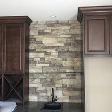 Love This Stone Backsplash By Rocktalks Custom Stoneworks In Lethbridge Ab With Our Creativemines Craft Split Modu Stone Backsplash Stacked Stone Stone Veneer