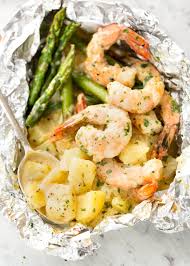 Creamy Garlic Shrimp Cheesy Potatoes And Asparagus Serious Contender For The Best Foil Packet Recipe Ever Www Foil Packet Meals Recipetin Eats Foil Dinners