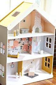 Well, believe it or not, you can still make a dollhouse happen with these skills! Diy Modern Dollhouse Tutorial The Pretty Life Girls Doll House Plans Modern Dollhouse Diy Dollhouse