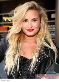 This is a stunning updo. Pictures Demi Lovato Hairstyles Demi Lovato S Blonde Tousled Waves