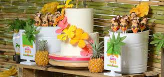 Take a pineapple and carve out small, oval shapes on three sides of the fruit. Kara S Party Ideas Hawaiian Luau Themed Birthday Party