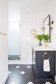 Hexagon tiles when used sympathetically can create stunning bathroom feature wall areas, and are ideal for splashbacks or zoning. Black And White Hexagon Tile Bathroom Floor Trendecors