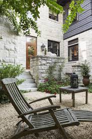 These billowing shades easily slide on the cables they hang from so you can have shade when you want it and retract them when you want a little more sun. Courtyard Gardens How To Get The Wow Factor All Year Round