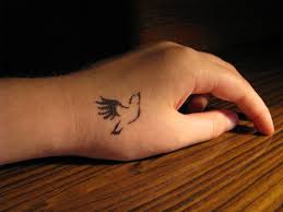 Small Bird Tattoo On Hand Simple Small Bird Tattoos Bird Tattoo Wrist Neck Tattoo