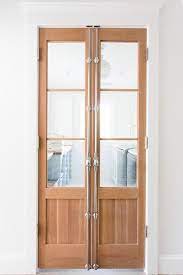 Often rabbeted doors are used for a traditional detail. Cremone Bolt Laundry Room Doors Transitional Laundry Room